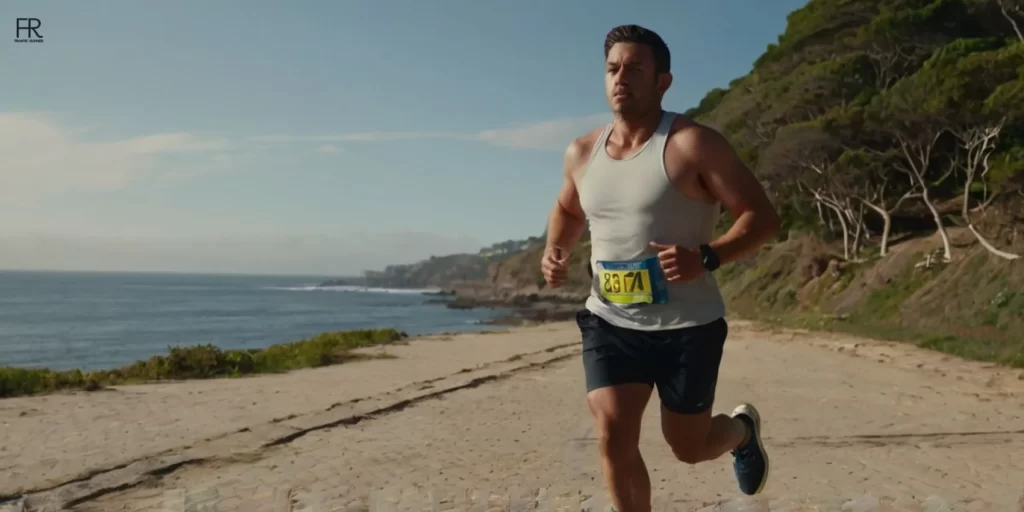 an image of a male runner running on the beach side for burning belly fat & love handles, while wearing running gear & running shoes