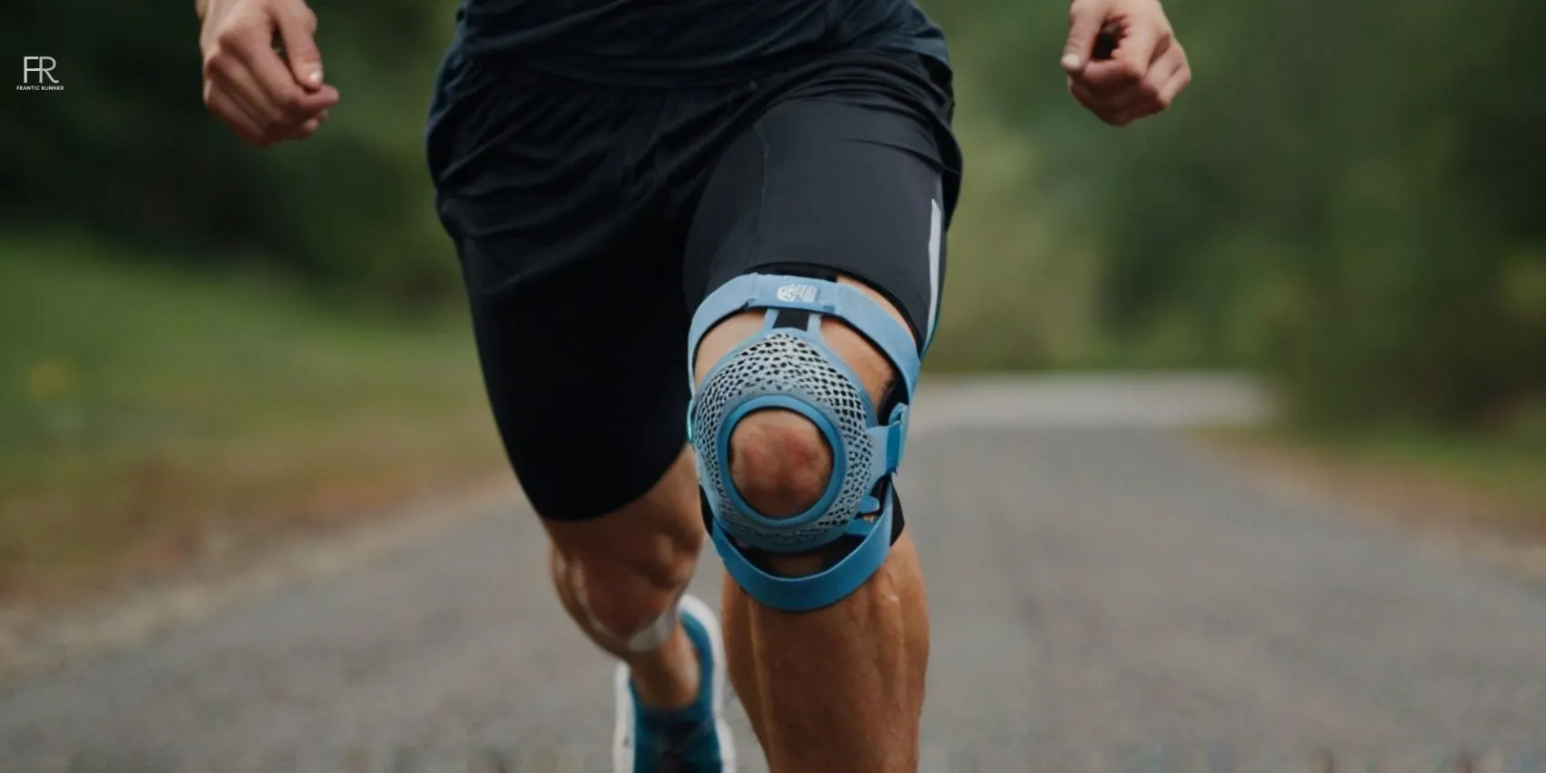 an image of a runner running on the road while wearing running gear & best knee brace for runners